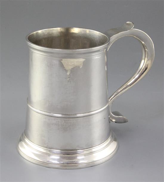 A George II provincial silver mug, height 143mm, weight 13.3oz/416grms.